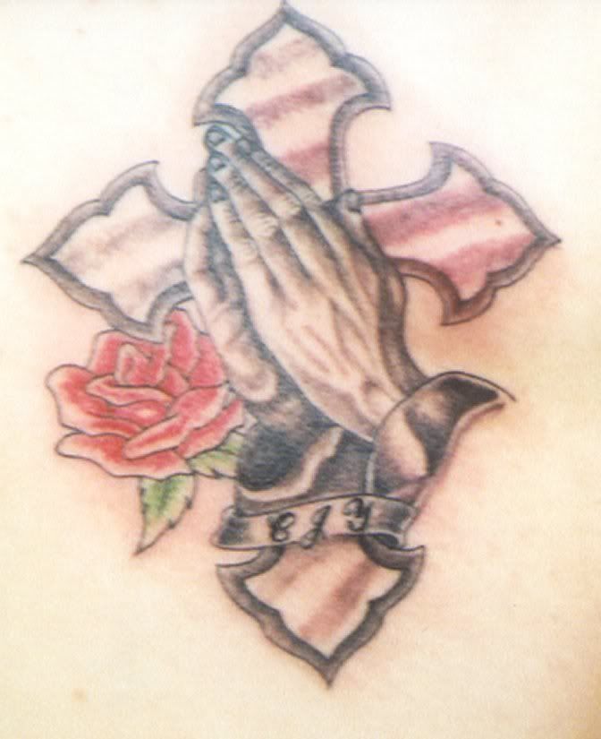 praying hands with cross tattoo. cross praying hands tattoo