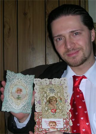 Michael holding some 19th century Valentine Cards