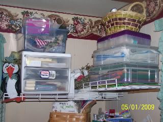 Corner shelving above my table...extra notions, bias tape, felt, doll patterns, thread spools , etc